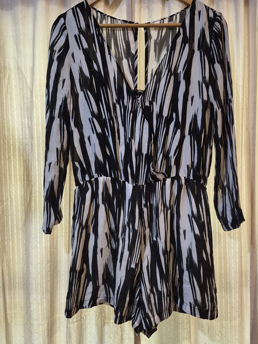 Stylish lightweight romper by Hazel featuring a bold black and white abstract